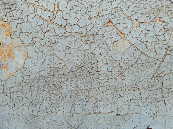 Textura velha parede de metal enferrujado como fundo — Fotografia de Stock