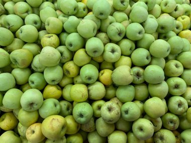 Arkaplan olarak yemek için olgun meyveli elmalar