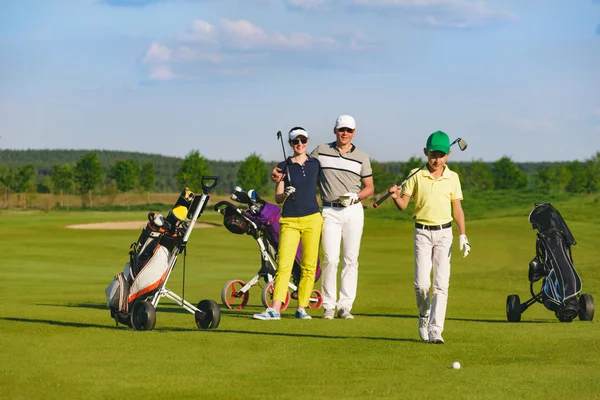 Family playing golf — Stock Photo © stock.sokolov.com.ua #131453318