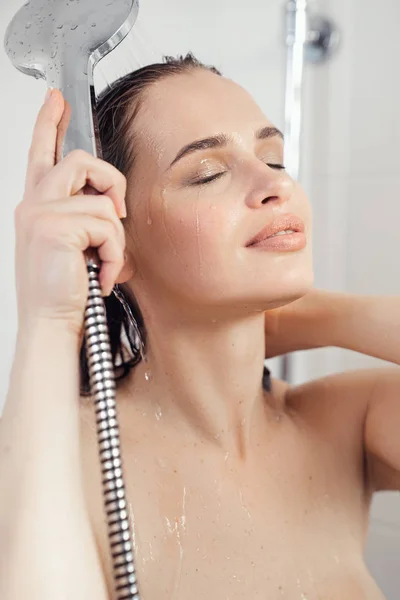 Photo of a sexy beautiful woman in shower washing body Stock Photo