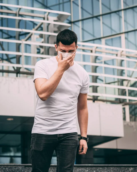 Man White Shirt Man White Mask His Face Sneezes His — Stock Photo, Image