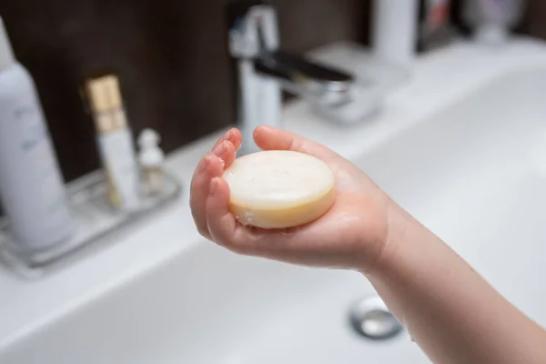 hands wash with soap in the sink. Hand washing with soap and water to prevent coronavirus and hygiene to stop the spread of coronavirus. the child washes his hands