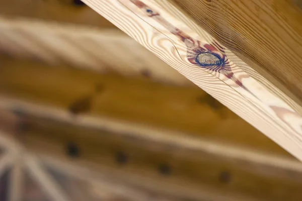 Yellow wooden element from roof structure construction closeup — Stock Photo, Image