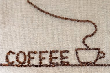 Çuval bezi çul tuval ve kahve çekirdekleri fotoğraf arka plan. Kopya 