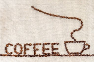 Çuval bezi çul tuval ve kahve çekirdekleri fotoğraf arka plan. Kopya 