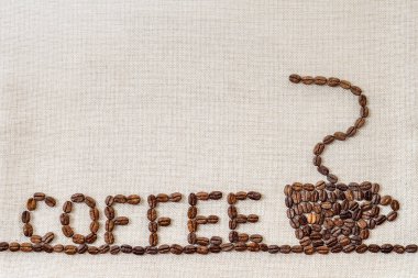 Çuval bezi çul tuval ve kahve çekirdekleri fotoğraf arka plan. Kopya 