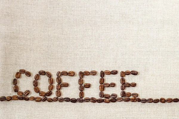 Çuval bezi çul tuval ve kahve çekirdekleri fotoğraf arka plan. Kopya 