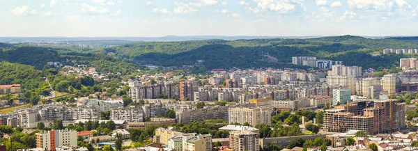 Aerial view of Lviv city. Panorama with modern buildings and urb