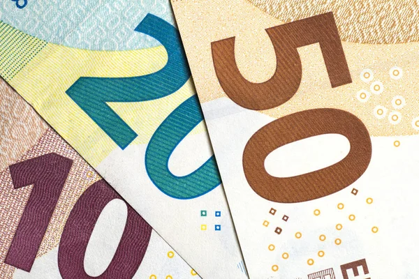Close up de dinheiro colorido euro. Fundo monetário do euro . — Fotografia de Stock