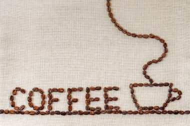 Çuval bezi çul tuval ve kahve çekirdekleri fotoğraf arka plan. Kopya 