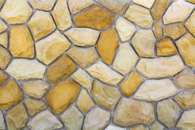 Kum taşı farklı boyutlarda. Taş duvar desen arka plan