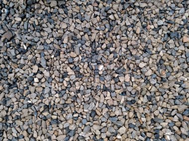 Arka plan ile farklı küçük deniz çakıl taşları