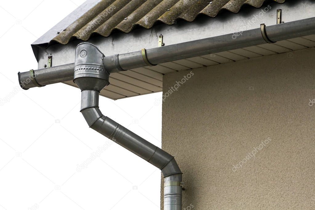 Corner of a house with a steel gutter system