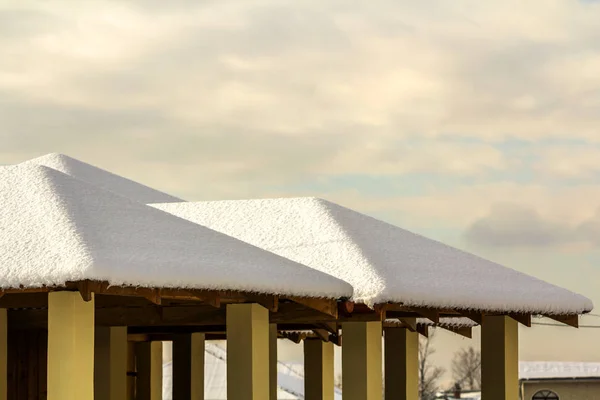 Roof of outdoor alcove covered with snow in winter — Stock Photo, Image