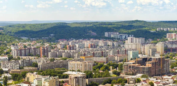 Aerial view of Lviv city. Panorama with modern buildings and urb