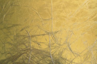 Parlak metal sarı doku arka plan. Metalik model