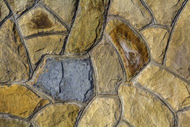 Kum taşı farklı boyutlarda. Taş duvar desen arka plan