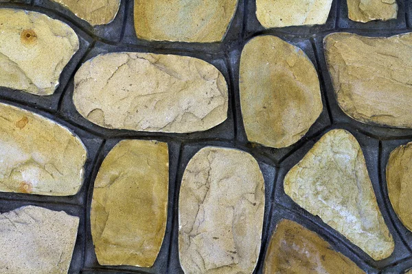 Różne rozmiary piasku kamienie. Kamienna ściana tło wzór — Zdjęcie stockowe