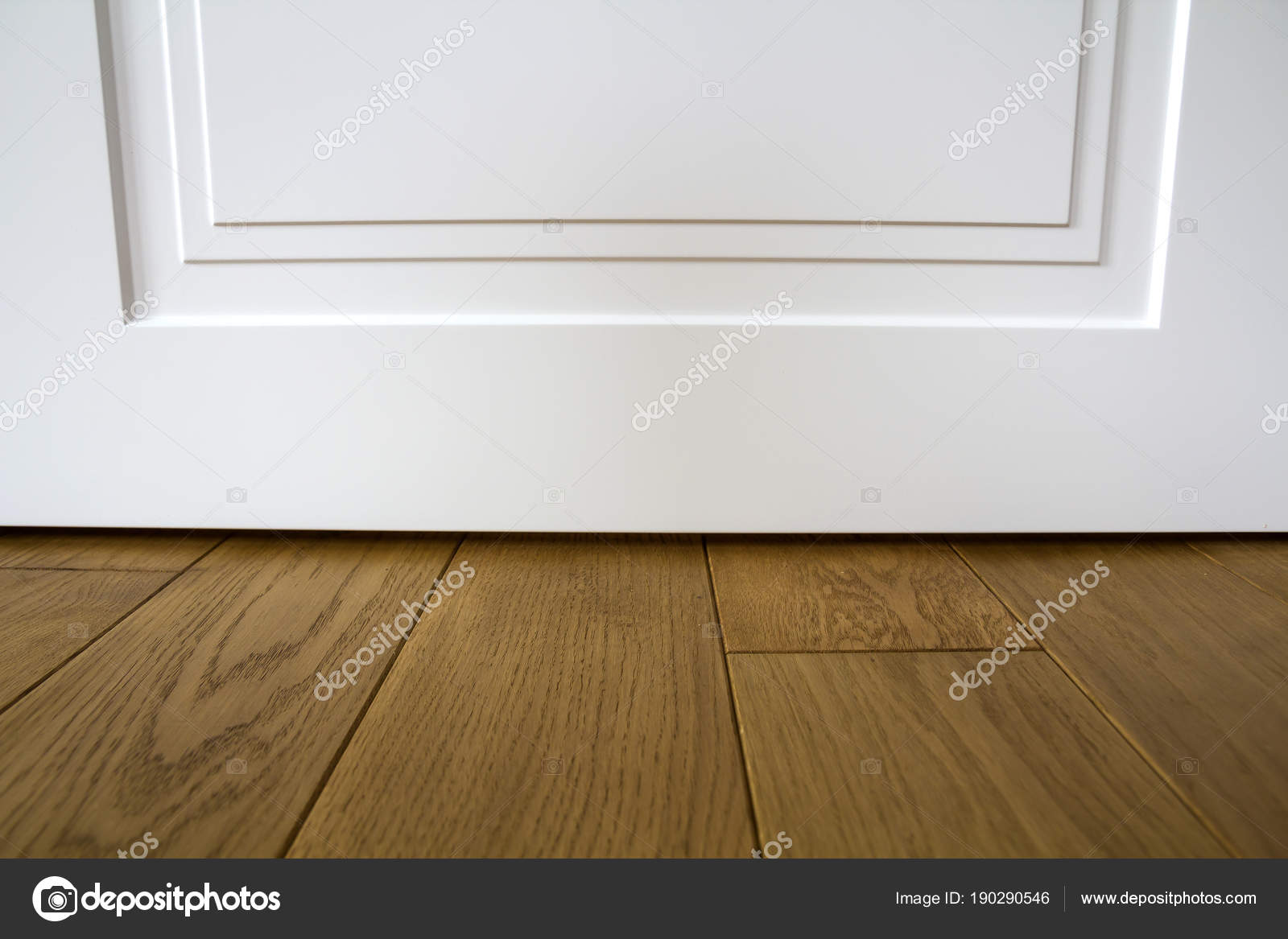 Modern House Interior Detail With Wooden Parquet Floor And White