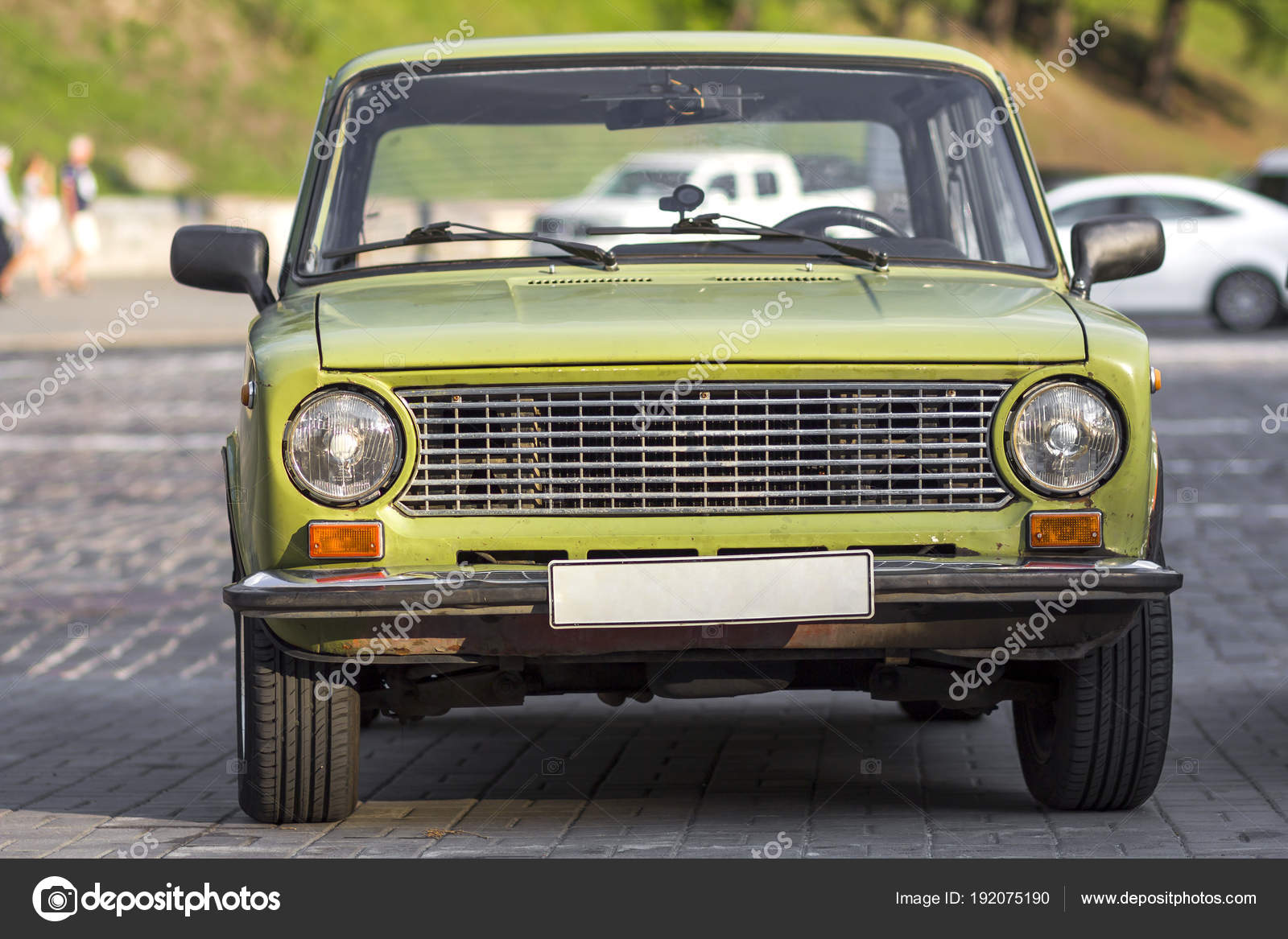Front view of old russian classic car on city street. Car front