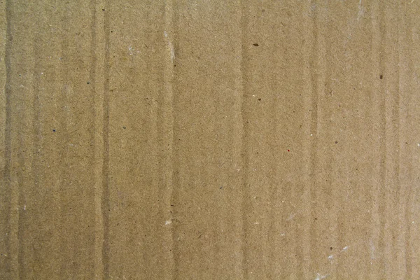 Cerrar viejo granulado decorativo marrón claro vintage hoja áspera de cartón papel textura o fondo . — Foto de Stock