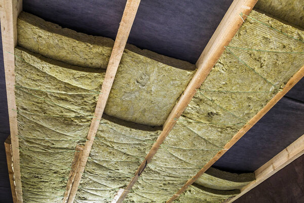 Thermal insulation mineral rock wool installation at the new bui