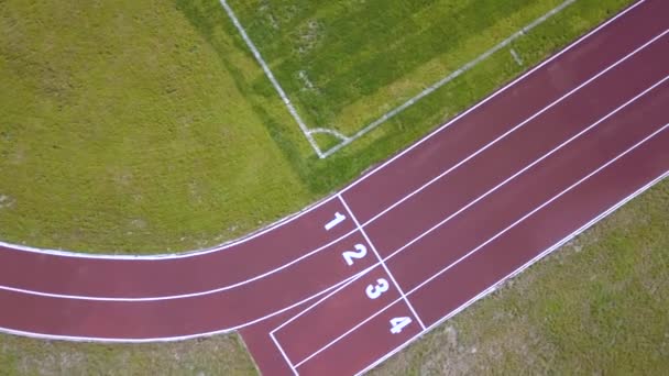 Bovenaanzicht Van Rode Pistes Groen Grasveld Infrastructuur Voor Sportactiviteiten — Stockvideo