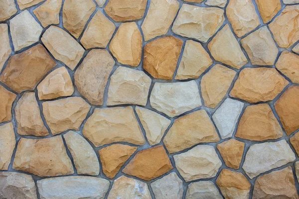 Surface murale abstraite faite de pierres de sable pour une utilisation comme backgro — Photo