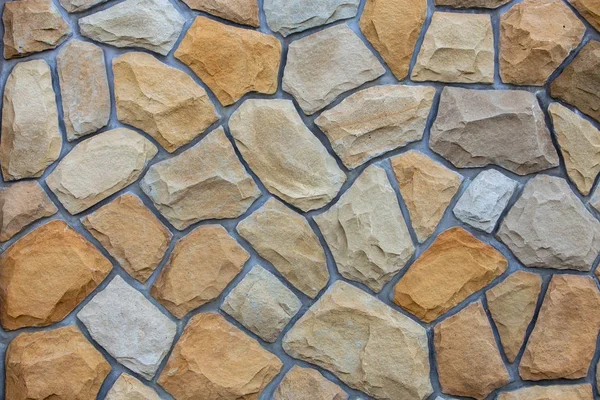 Abstrakt väggyta gjord av sandsten för användning som bakgrundsgro — Stockfoto