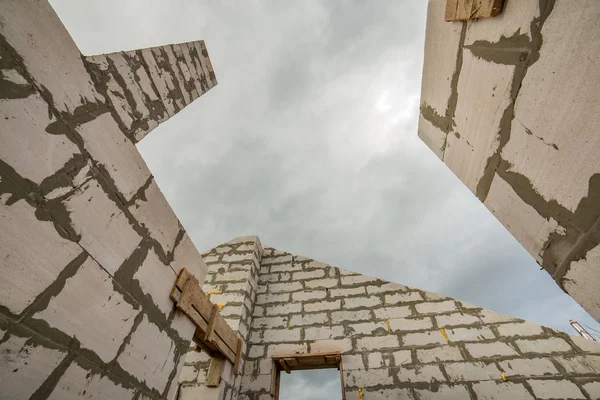 Building site of a house under construction made from white foam — Stock Image Building site of a house under construction made from white foam Royalty Free Stock Images