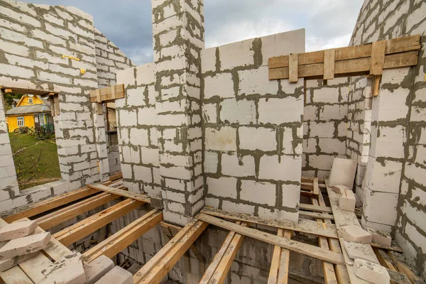 Building site of a house under construction made from white foam — Stock Image Building site of a house under construction made from white foam Stock Image