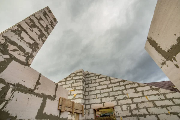 Building site of a house under construction made from white foam — Stock Image Building site of a house under construction made from white foam Stock Picture