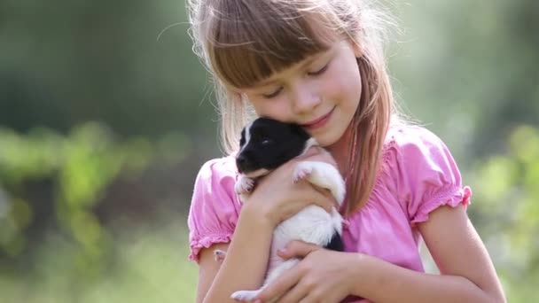 Pretty Child Girl Playing Little Puppy Outdoors Summer — Stock Video