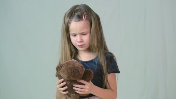 Pretty Child Girl Playing Her Teddy Bear Toy — Stock Video