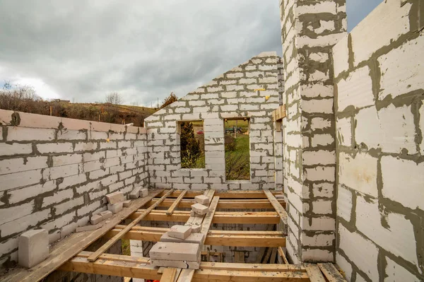 Building site of a house under construction made from white foam — Stock Image Building site of a house under construction made from white foam Royalty Free Stock Photos