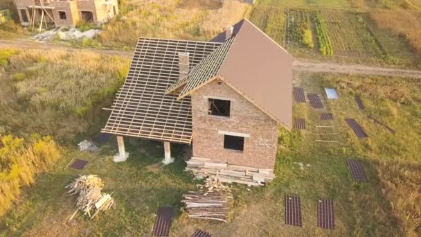 Aerial View Unfinished House Wooden Roof Structure Covered Metal Tile — Stock Video