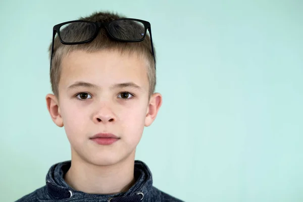 Close up portrait of a child school boy wearing glasses. — Stock Photo, Image