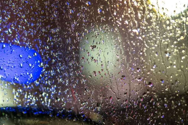 Abstract colorful background of glass surface with water drops a — Stock Photo, Image