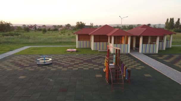 Footage Preeschool Yard Swings Slides Modern Daycare School Building — Stock Video