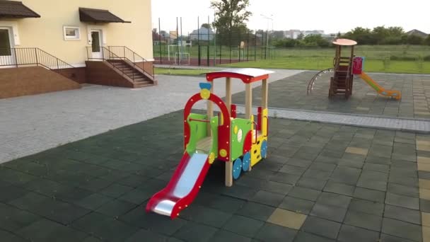 Footage Preeschool Yard Swings Slides Modern Daycare School Building — Stock Video