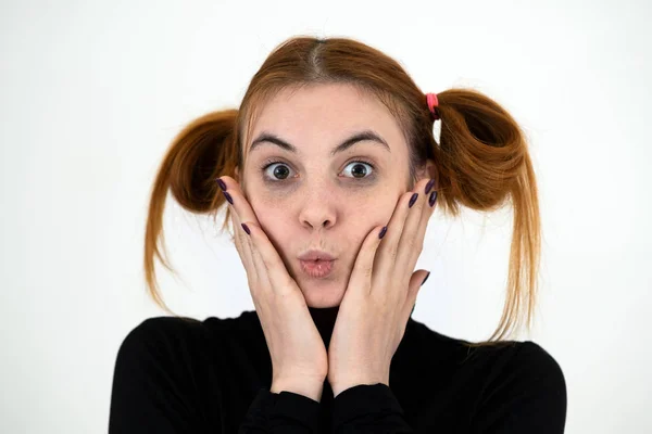Closeup portrait of a funny redhead teenage girl with childish h — Stock Photo, Image
