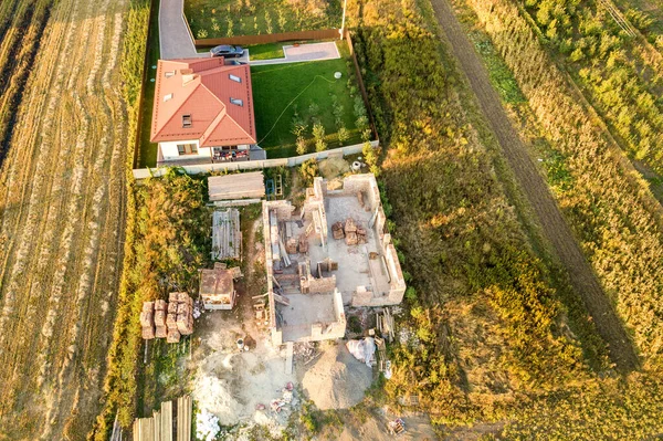 Top Aerial View Two Private Houses One Construction Concrete Foundament — Stock Photo, Image