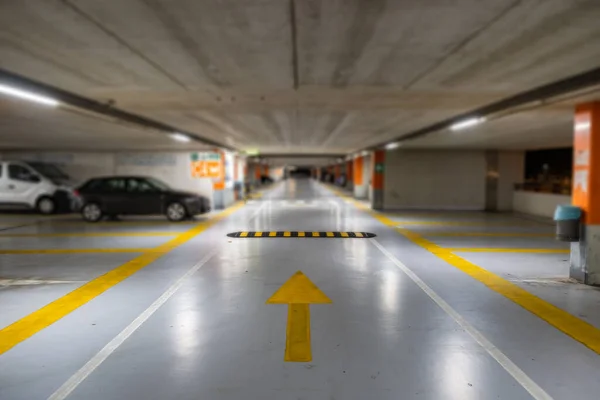 Yellow Markings Blurred Modern Cars Parked Closed Underground Parking Lot — 스톡 사진