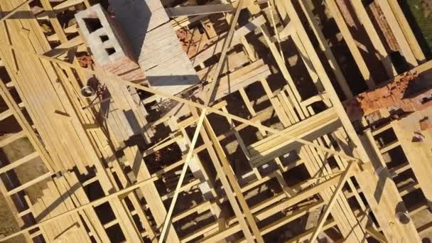 Aerial View Unfinished Brick House Wooden Roof Frame Structure Construction — Stock Video