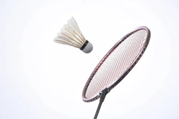 Badmintonbollen och racket — Stockfoto