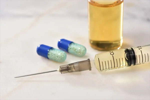 Closeup Syringe Drug Bottle Medicinecapsule — Stock Photo, Image