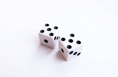 Two white dice with fives clipart