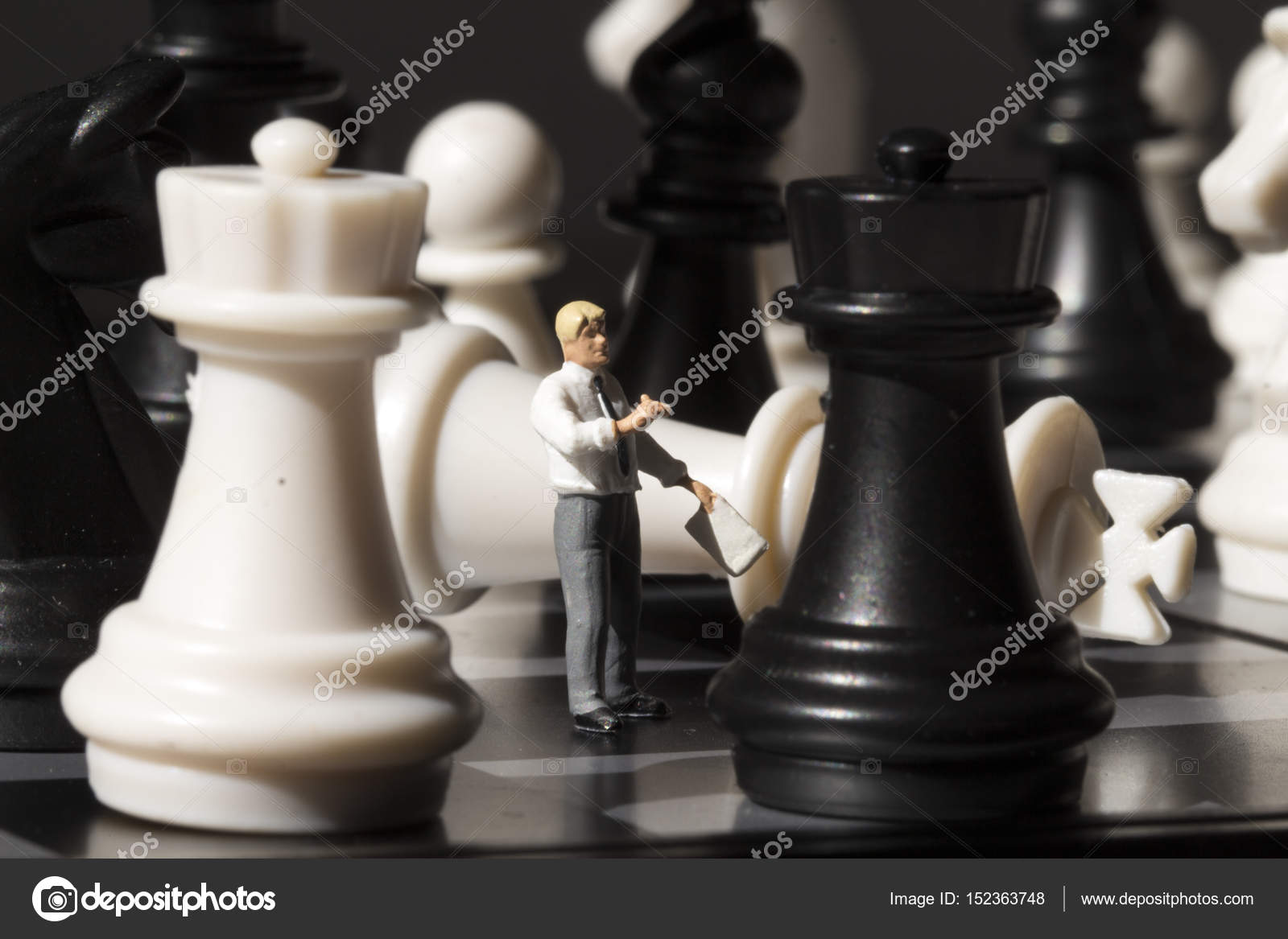 Chessman And Chess King Fall On Game Board Playing With Miniature Doll Macro Photo Man Explains Rules Teacher Puppet Chessboard Chessman And Chess King Fall On Game Board Playing With Miniature Doll Macro Photo Man Explains Rules Teacher Puppet Chessboard
