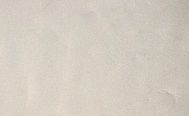 Pürüzsüz beyaz kum plaj dokusu. Tropikal plaj fotoğraf arka plan.