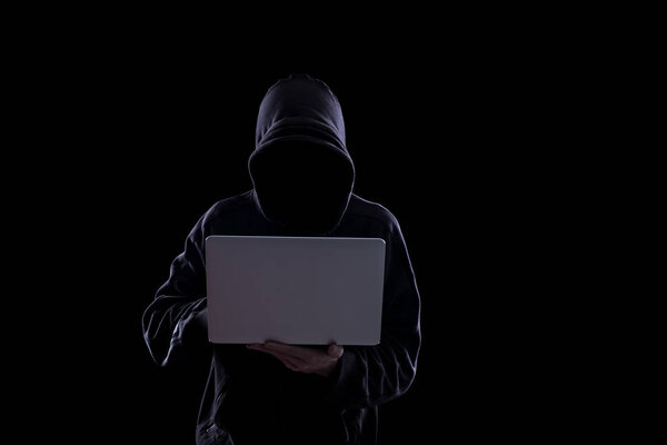 Anonymous hacker in the dark